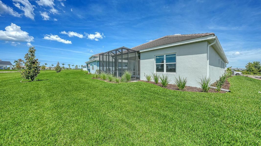Exterior details and patio area of a home in Palmera Real Estate and Homes for Sale in Venice, FL - Neal Communities, Venice (Image 24). Exterior details and patio area of a home in Palmera Real Estate and Homes for Sale in Venice, FL - Neal Communities, Venice (Image 24).