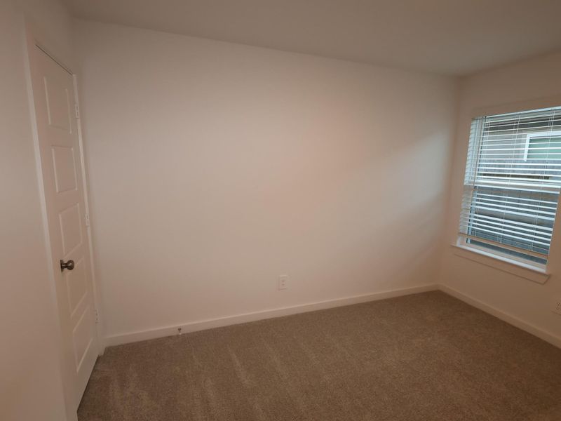 Spacious, unfurnished interior of a new home in Pinewood at Grand Texas, New Caney (Image 9).