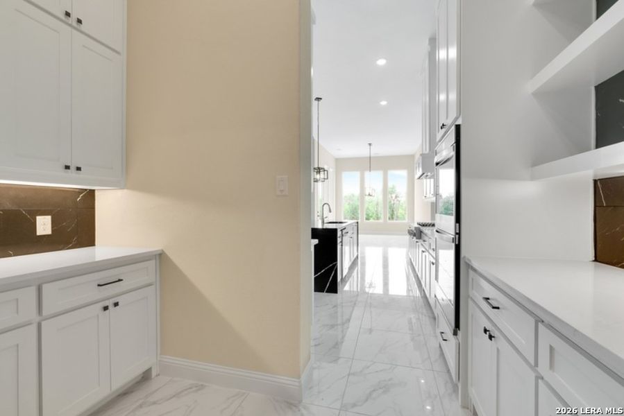 Furnished interior view inside a new home in Shavano Highlands, San Antonio (Image 6).