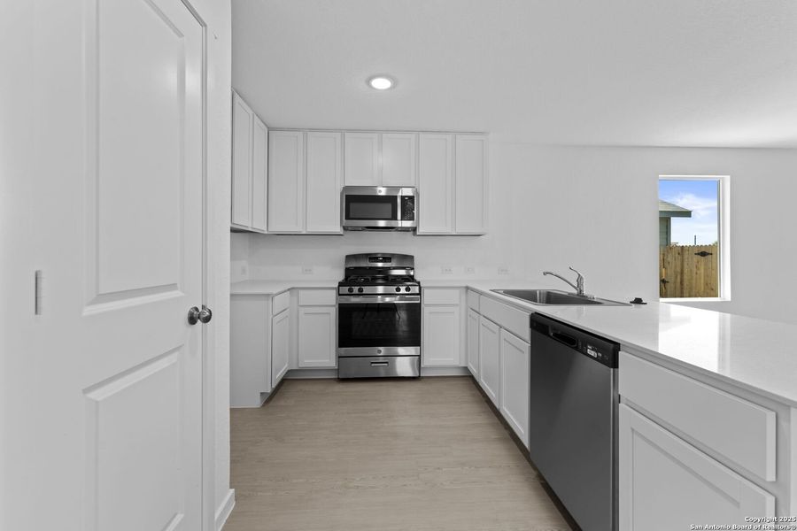 Furnished interior view inside a new home in Lodi Grove, Floresville (Image 8). Furnished interior view inside a new home in Lodi Grove, Floresville (Image 8).