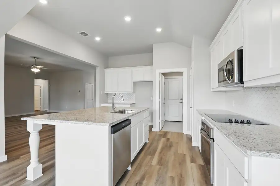 Representative furnished interior of a home built from the McKinley I by Cheldan Homes in Horizons at Bankston Estates, Venus (Image 10).