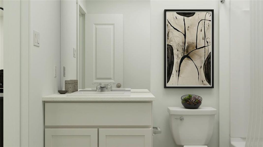 Bathroom with vanity and toilet