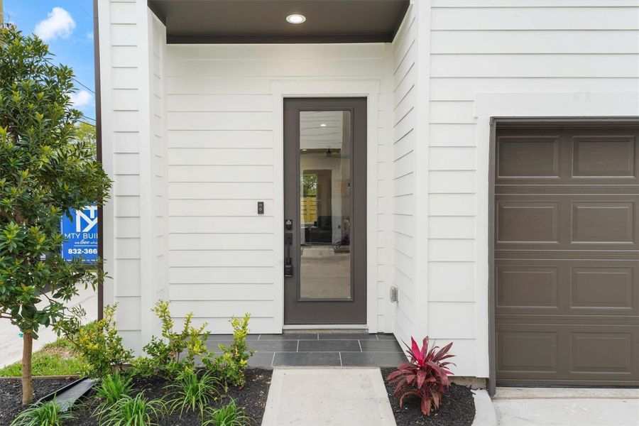 Exterior details and patio area of a home in Blalock Square, Houston (Image 19).