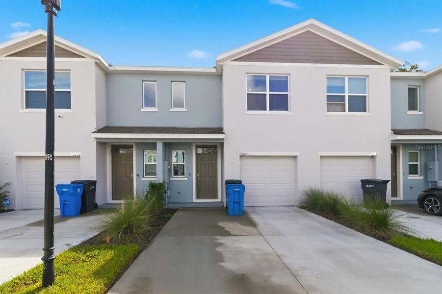 Front exterior of a new home in , Tampa, FL, highlighting curb appeal (Image 23).