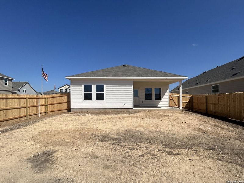 Exterior details and patio area of a home in Hennersby Hollow, San Antonio (Image 3).