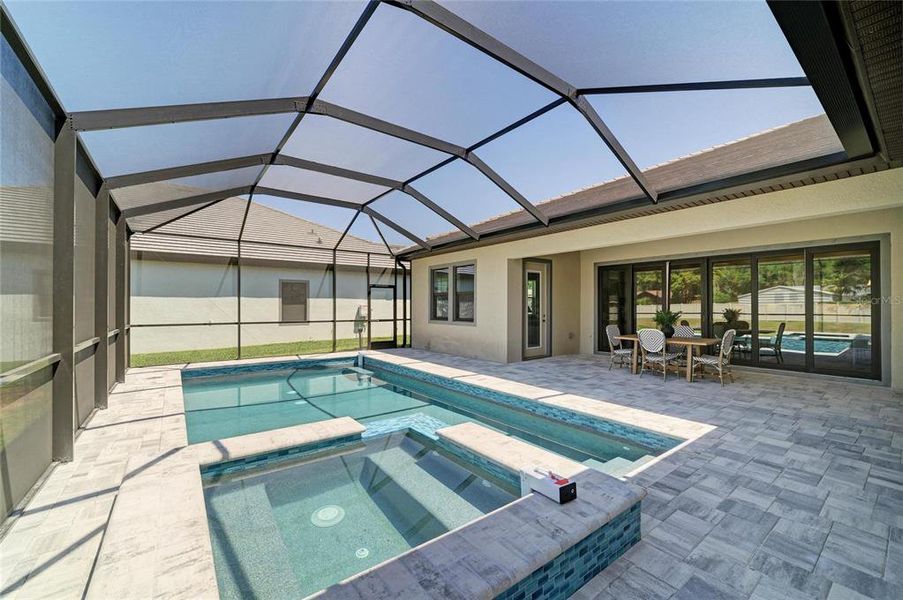 Exterior details and patio area of a home in Hidden Lakes, Brandon (Image 30).