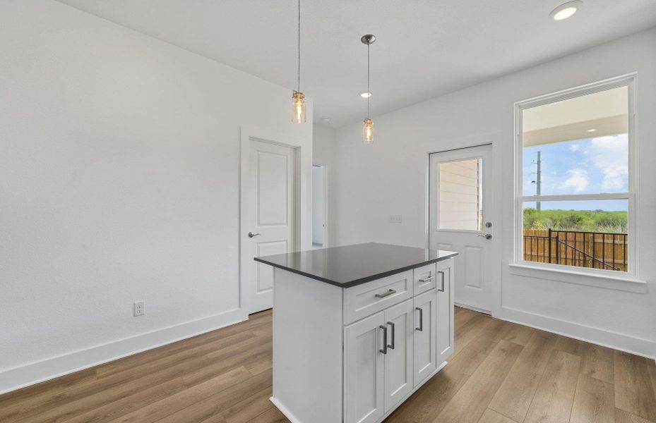 Furnished interior view inside a new home in Crosswinds, Kyle (Image 4).