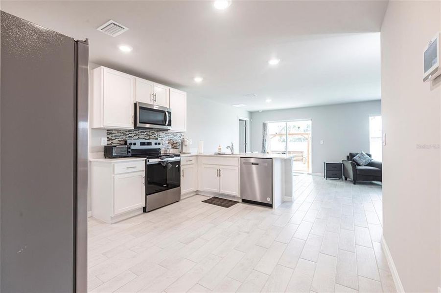 Furnished interior view inside a new home in , Port Charlotte (Image 16).