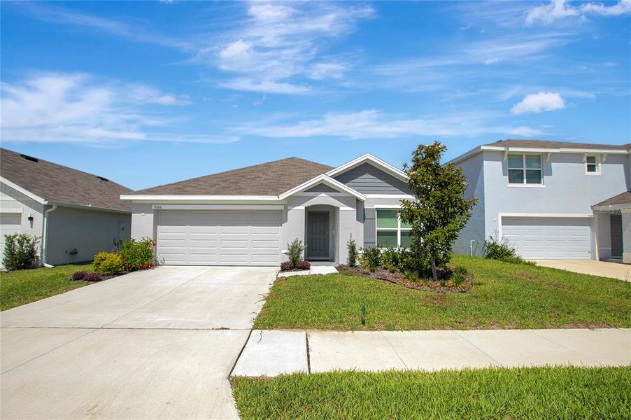 Front exterior of a new home in River Park, Temple Terrace, FL, highlighting curb appeal (Image 26).