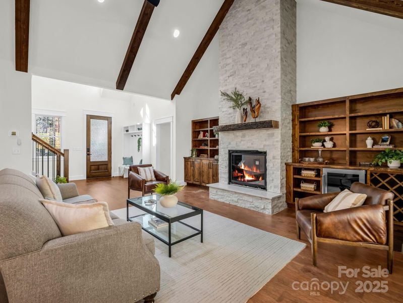 Custom wood beams and gas fireplace