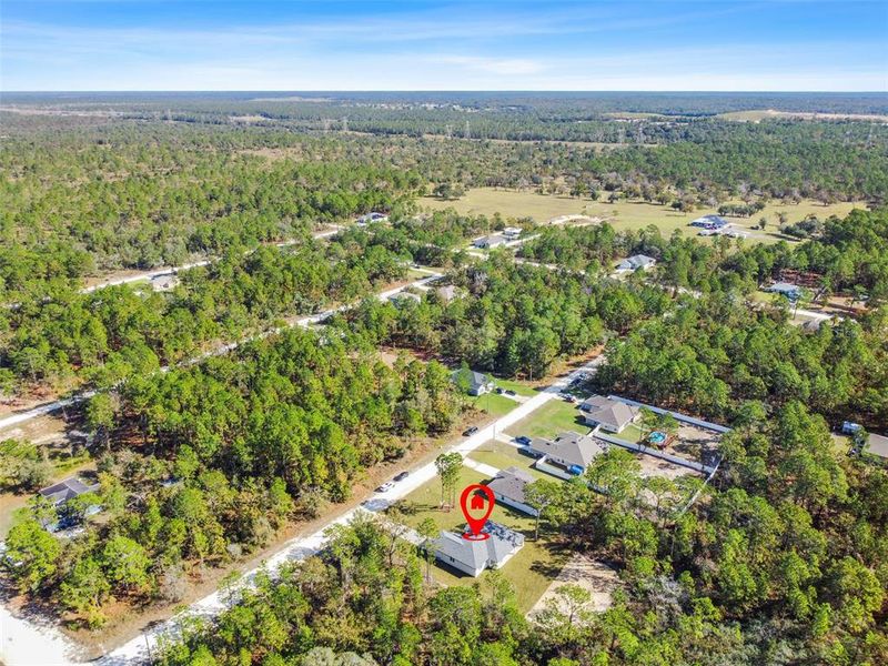 Front exterior of a new home in , Weeki Wachee, FL, highlighting curb appeal (Image 36). Front exterior of a new home in , Weeki Wachee, FL, highlighting curb appeal (Image 36).