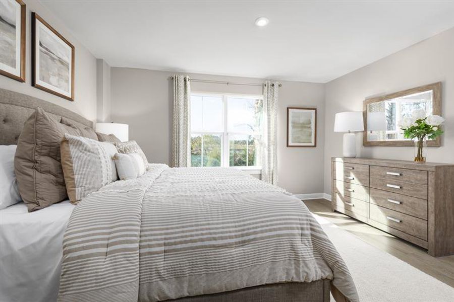 Representative furnished interior of a home built from the Nassau Cove Quick Move-In by Ryan Homes in Cobblestone at East Argent, Hardeeville (Image 12).