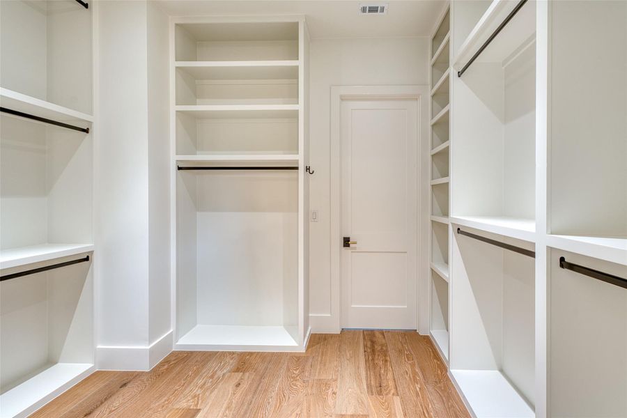 Door in closet leads to laundry room!