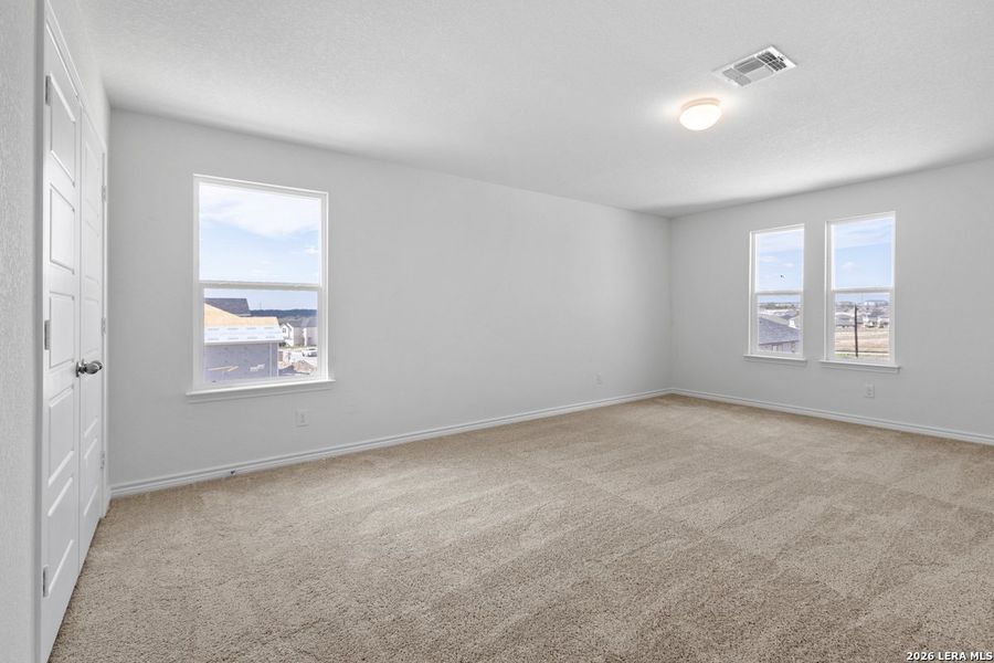 Spacious, unfurnished interior of a new home in Hidden Bluffs at TRP, San Antonio (Image 18).