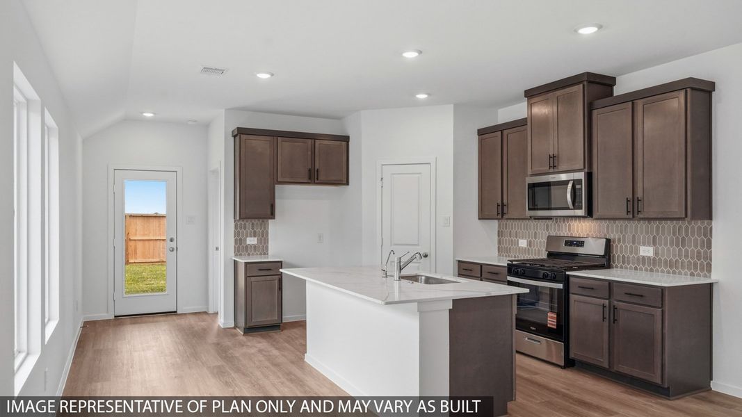 Furnished interior view inside a new home in Sunterra Lakes, Katy (Image 3).