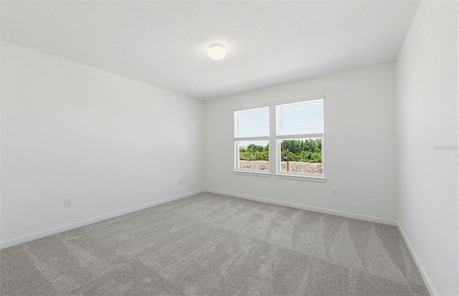 Spacious, unfurnished interior of a new home in Vida's Way, Wesley Chapel (Image 11).