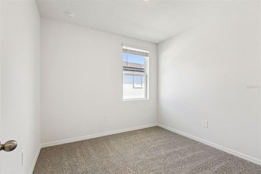 Spacious, unfurnished interior of a new home in Springs at Lake Alfred - Classic Series, Lake Alfred (Image 25).