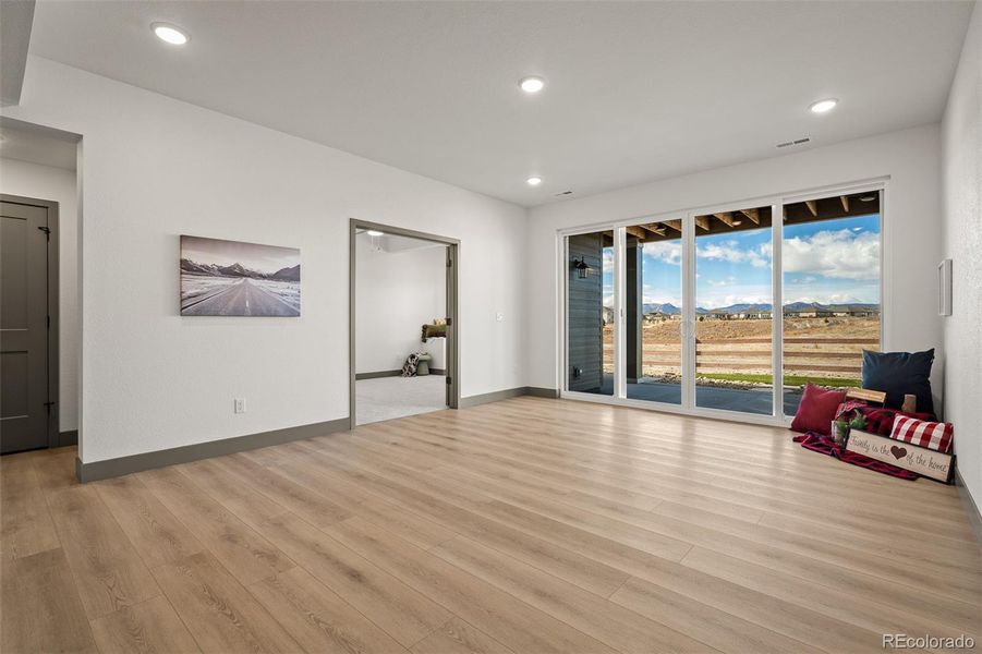 Spacious, unfurnished interior of a new home in Revel Crossing at Wolf Ranch - The Panorama Collection, Colorado Springs (Image 23).