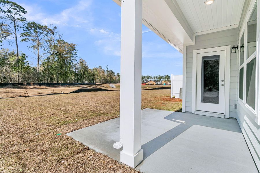 Exterior details and patio area of a home in , Ravenel (Image 3).