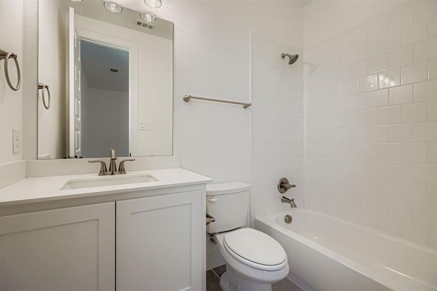 Full bathroom with vanity and shower / bath combination