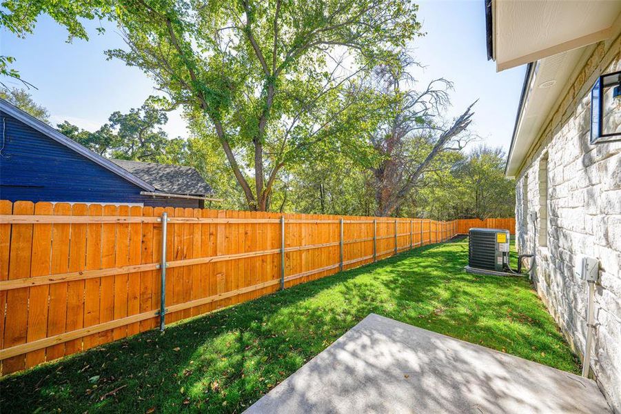 Side exit to patio and backyard Side exit to patio and backyard