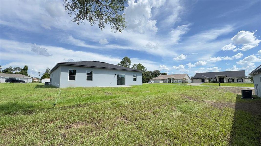 Front exterior of a new home in , Ocala, FL, highlighting curb appeal (Image 13). Front exterior of a new home in , Ocala, FL, highlighting curb appeal (Image 13).