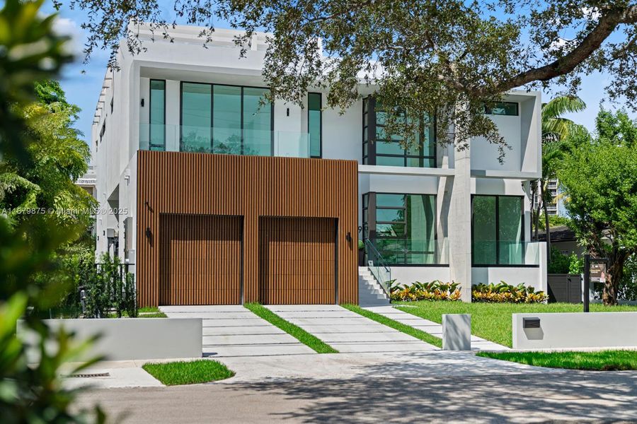 Front exterior of a new home in , Miami Shores, FL, highlighting curb appeal (Image 22).