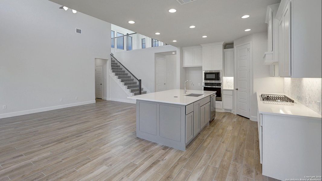 Furnished interior view inside a new home in Ladera 50', San Antonio (Image 14).