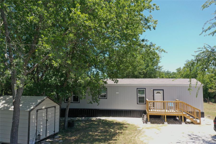 Exterior details and patio area of a home in , Mexia (Image 18). Exterior details and patio area of a home in , Mexia (Image 18).