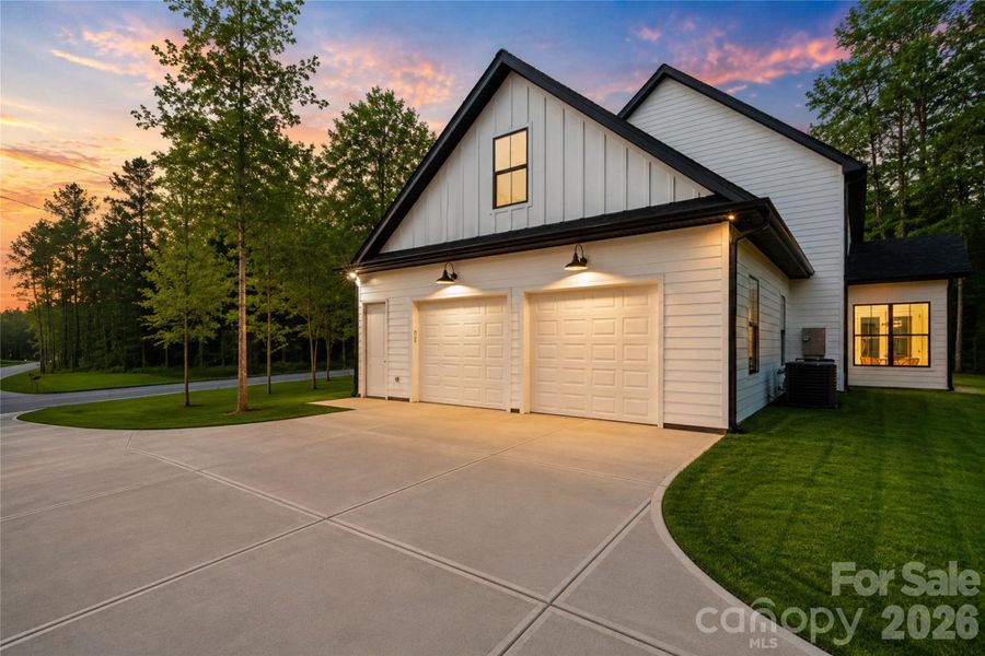 Front exterior of a new home in , Clover, SC, highlighting curb appeal (Image 27).