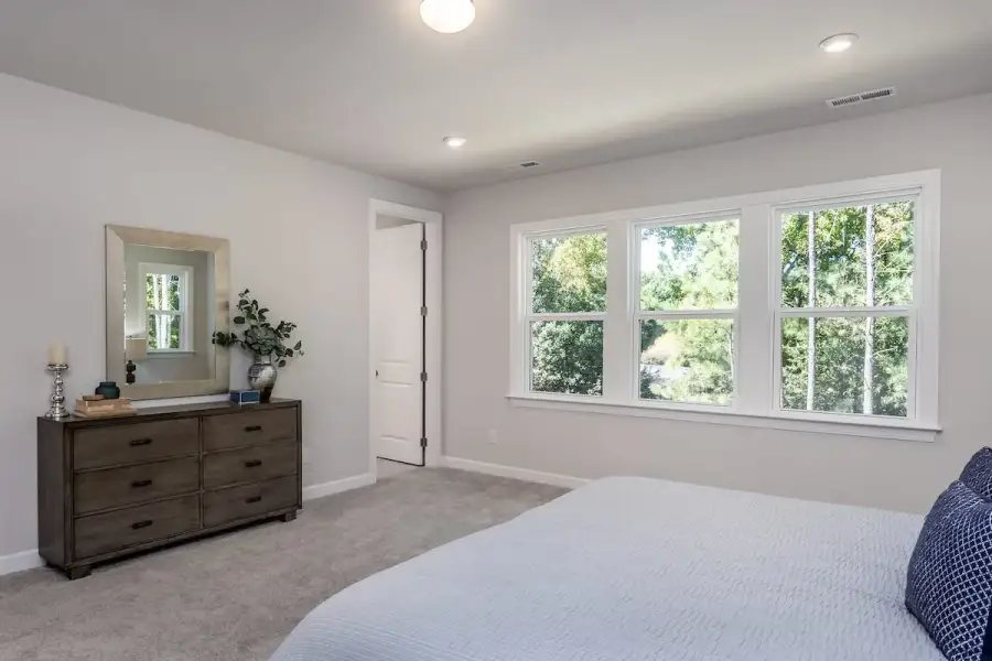 Furnished interior view inside a new home in The Townes at Willow Park, Cary (Image 9).
