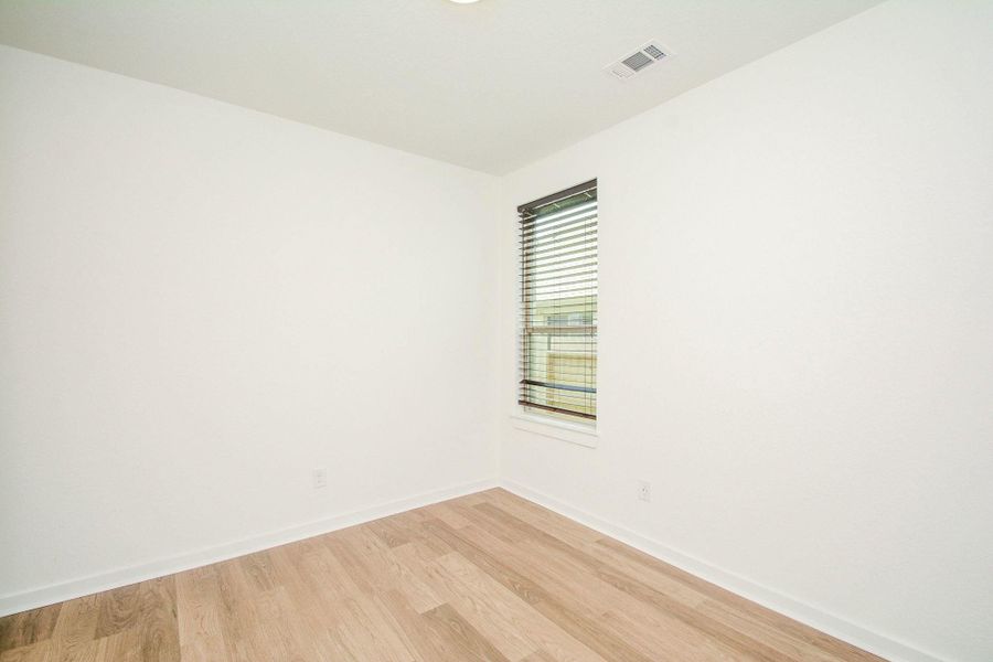 Bright and airy secondary bedroom with neutral finishes. Bright and airy secondary bedroom with neutral finishes.