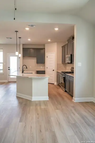 Furnished interior view inside a new home in Morgan Meadows, San Antonio (Image 6).