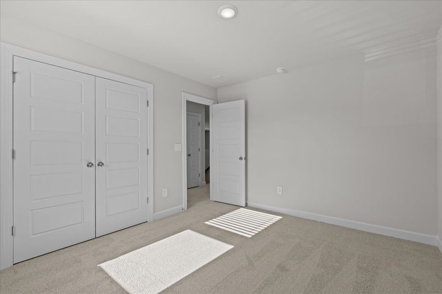 Spacious, unfurnished interior of a new home in The Farm at Wells Creek - Signature Collection, Gray Court (Image 22).