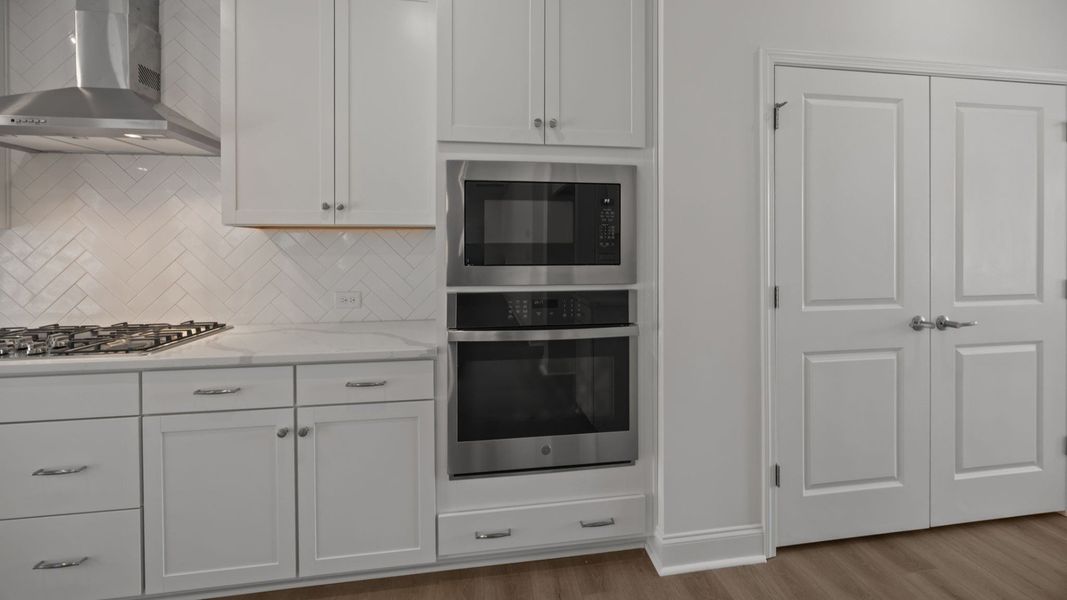 The Burton Plan in Farms at Bellingham by DRB Homes in Charlotte NC - Kitchen