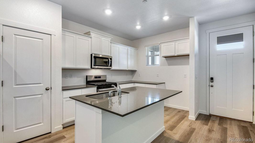Furnished interior view inside a new home in Settlers Crossing, Commerce City (Image 8).