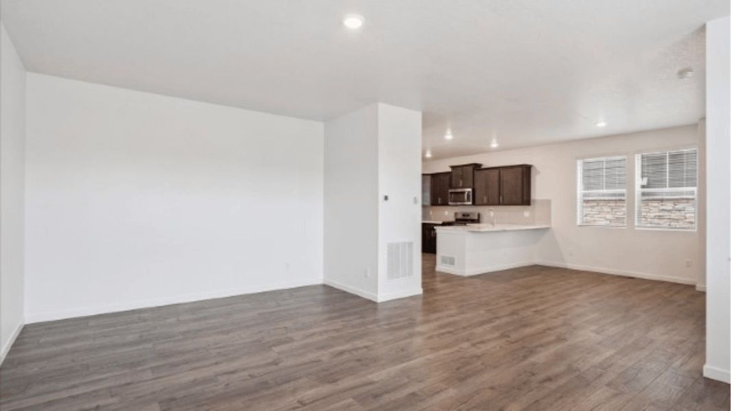 Representative unfurnished interior of a home built from the Elbert by D.R. Horton in Sky Ranch, Watkins (Image 8). Representative unfurnished interior of a home built from the Elbert by D.R. Horton in Sky Ranch, Watkins (Image 8).