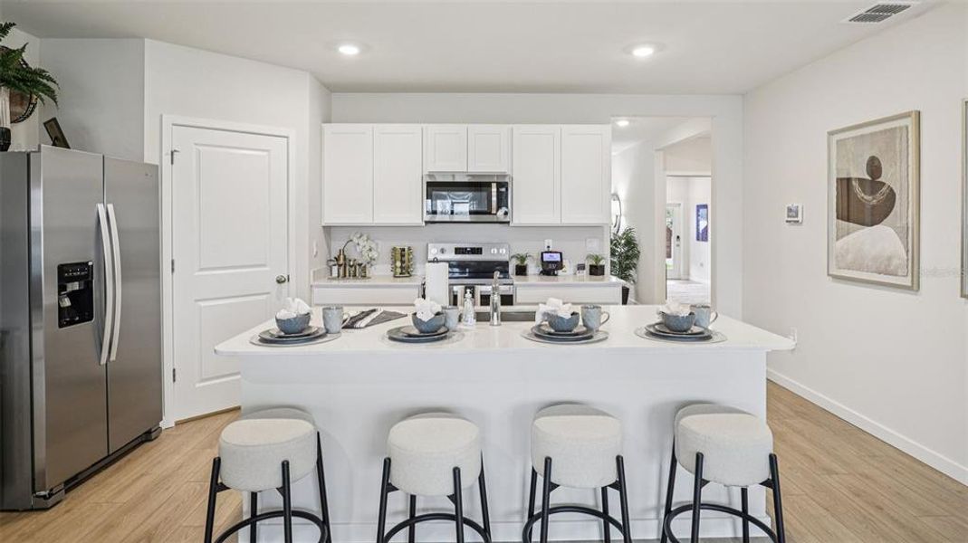 Furnished interior view inside a new home in Seagrass - Express & Tradition, Punta Gorda (Image 30). Furnished interior view inside a new home in Seagrass - Express & Tradition, Punta Gorda (Image 30).