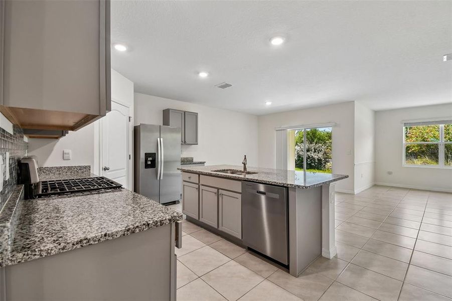 Furnished interior view inside a new home in Riviera Bella, Debary (Image 5).