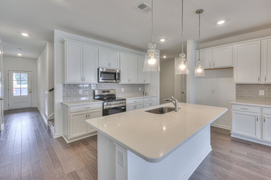 *Photo of example home. Selections & Finishes May Vary.