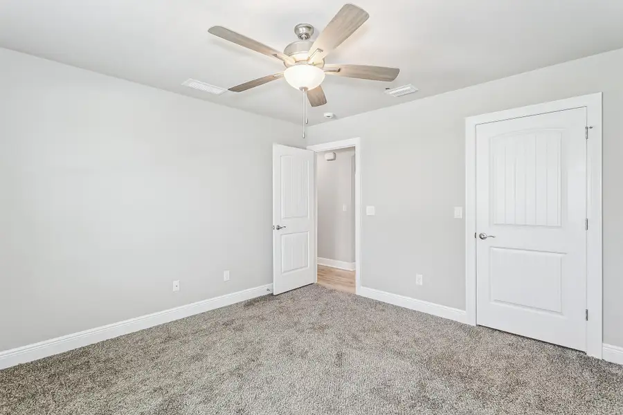 Spacious, unfurnished interior of a new home in Prosperity Point, Milton (Image 25). Spacious, unfurnished interior of a new home in Prosperity Point, Milton (Image 25).