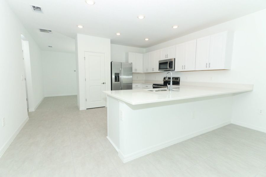 Furnished interior view inside a new home in Marion Creek, Haines City (Image 11).