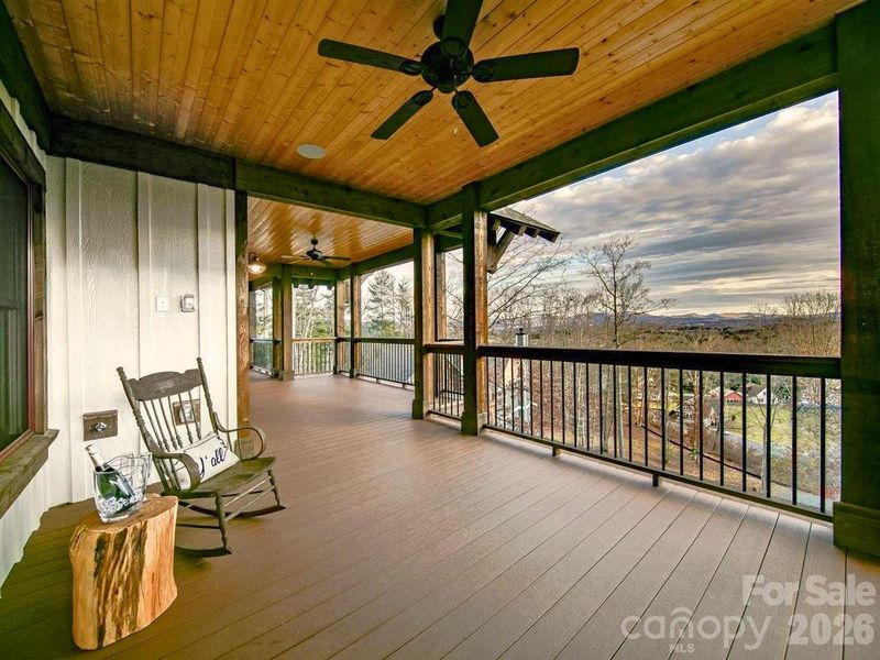 Relax and enjoy the mountain views from the covered porch. Representative photo from Corner Rock Builders showing the craftsmanship, quality of construction and finish level. Relax and enjoy the mountain views from the covered porch. Representative photo from Corner Rock Builders showing the craftsmanship, quality of construction and finish level.