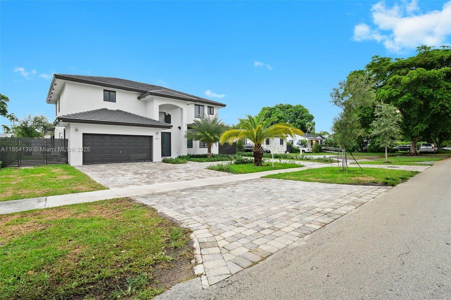 Front exterior of a new home in , Miami Springs, FL, highlighting curb appeal (Image 23).