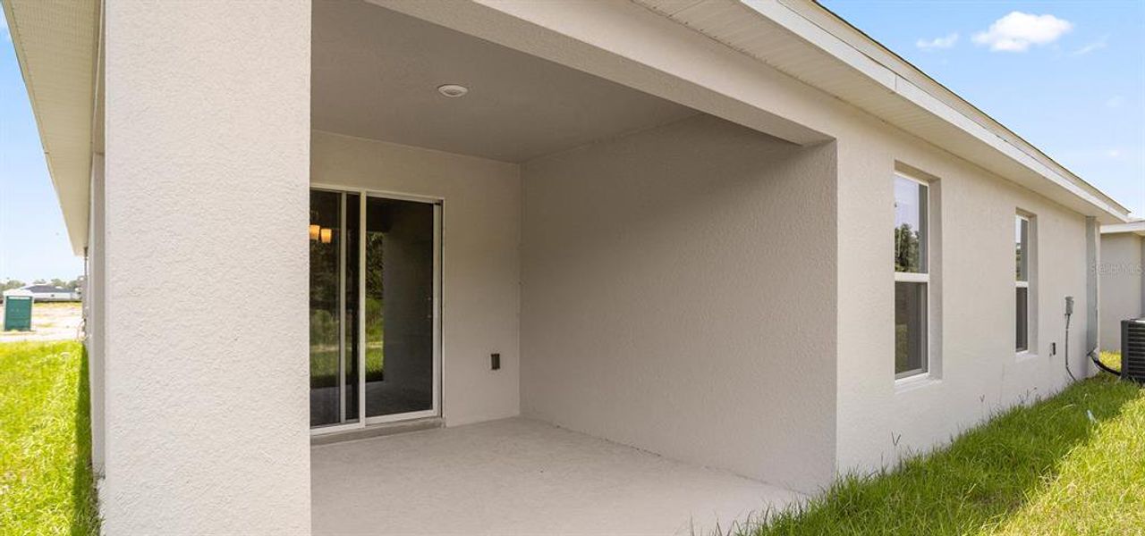 Exterior details and patio area of a home in The Crossings - Single-Family Homes, St. Cloud (Image 2).