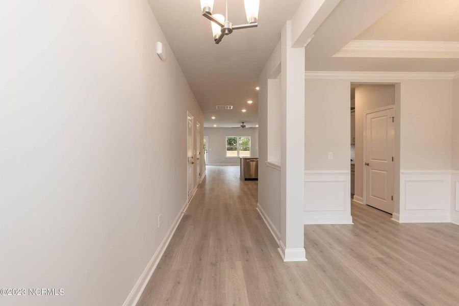 Representative unfurnished interior of a home built from the 3105 by Adams Homes in Parkland Place, Pace (Image 11).