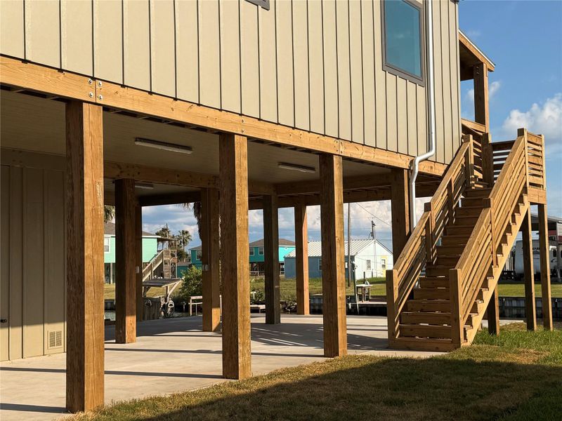 Front exterior of a new home in , Sargent, TX, highlighting curb appeal (Image 16). Front exterior of a new home in , Sargent, TX, highlighting curb appeal (Image 16).