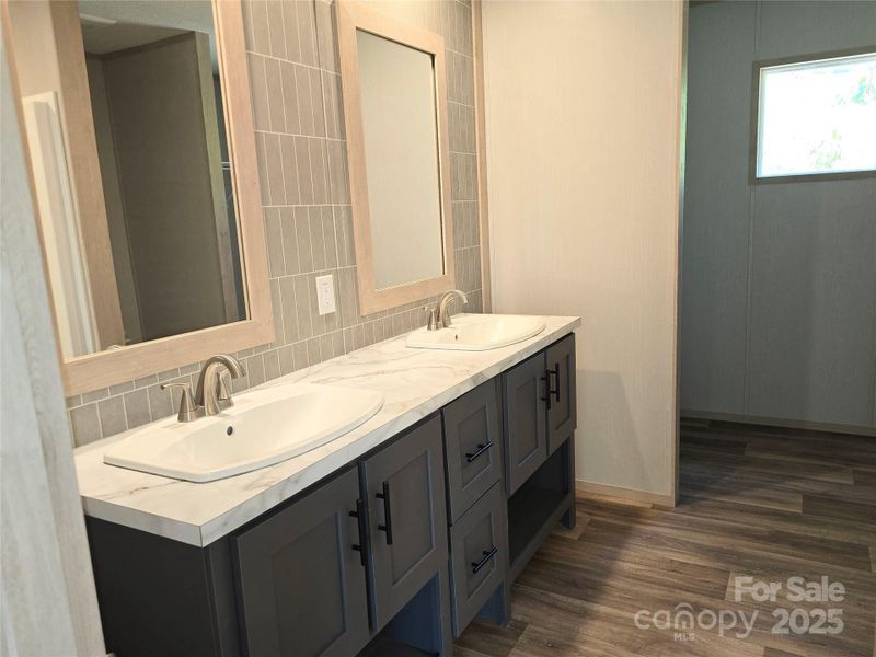 Primary bathroom with double vanity. Primary bathroom with double vanity.