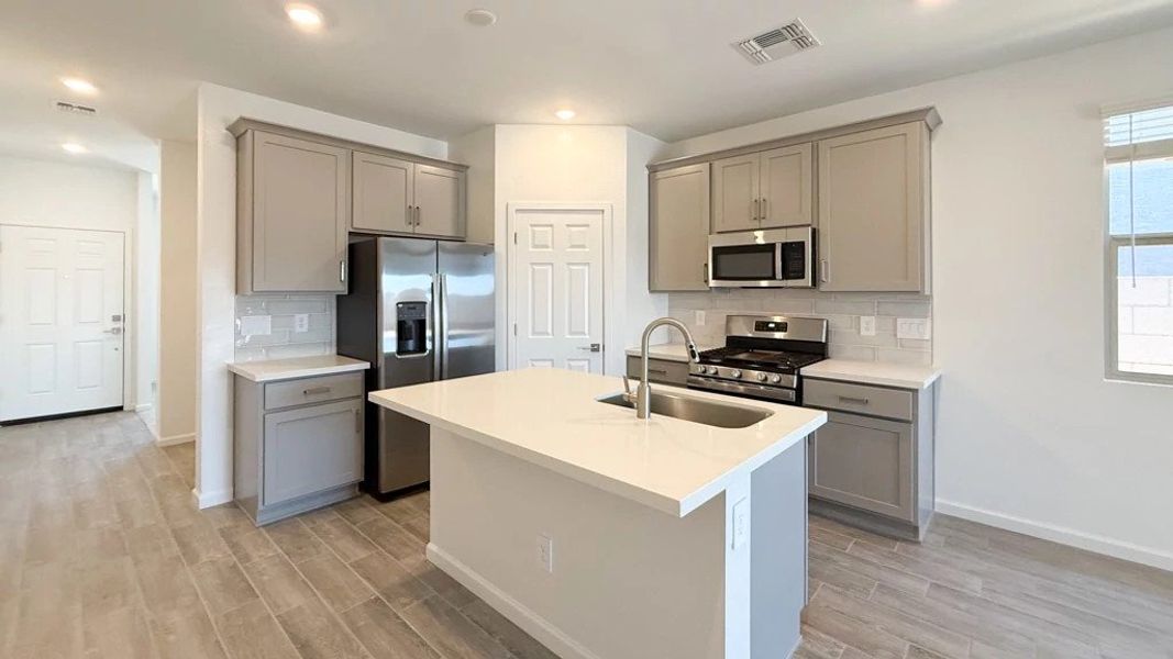 Kitchen featuring the Milan Collection Kitchen featuring the Milan Collection