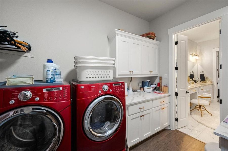 Laundry is right off of the primary bathroom